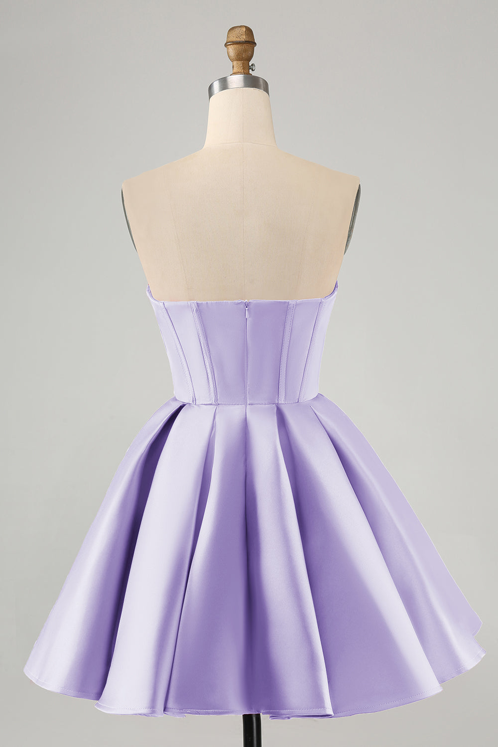 Jolie robe de soirée courte fuchsia à décolleté en cœur et corset avec perles