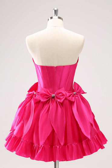 Süßes, fuchsiafarbenes, trägerloses A-Linien-Heimkehrkleid mit Korsett, Rüschen und Perlen