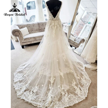 Roycebridal Robe de mariée trapèze en dentelle, sans manches, décolleté en V profond, style bohème, traîne, été 2025, robes de mariée élégantes sur mesure