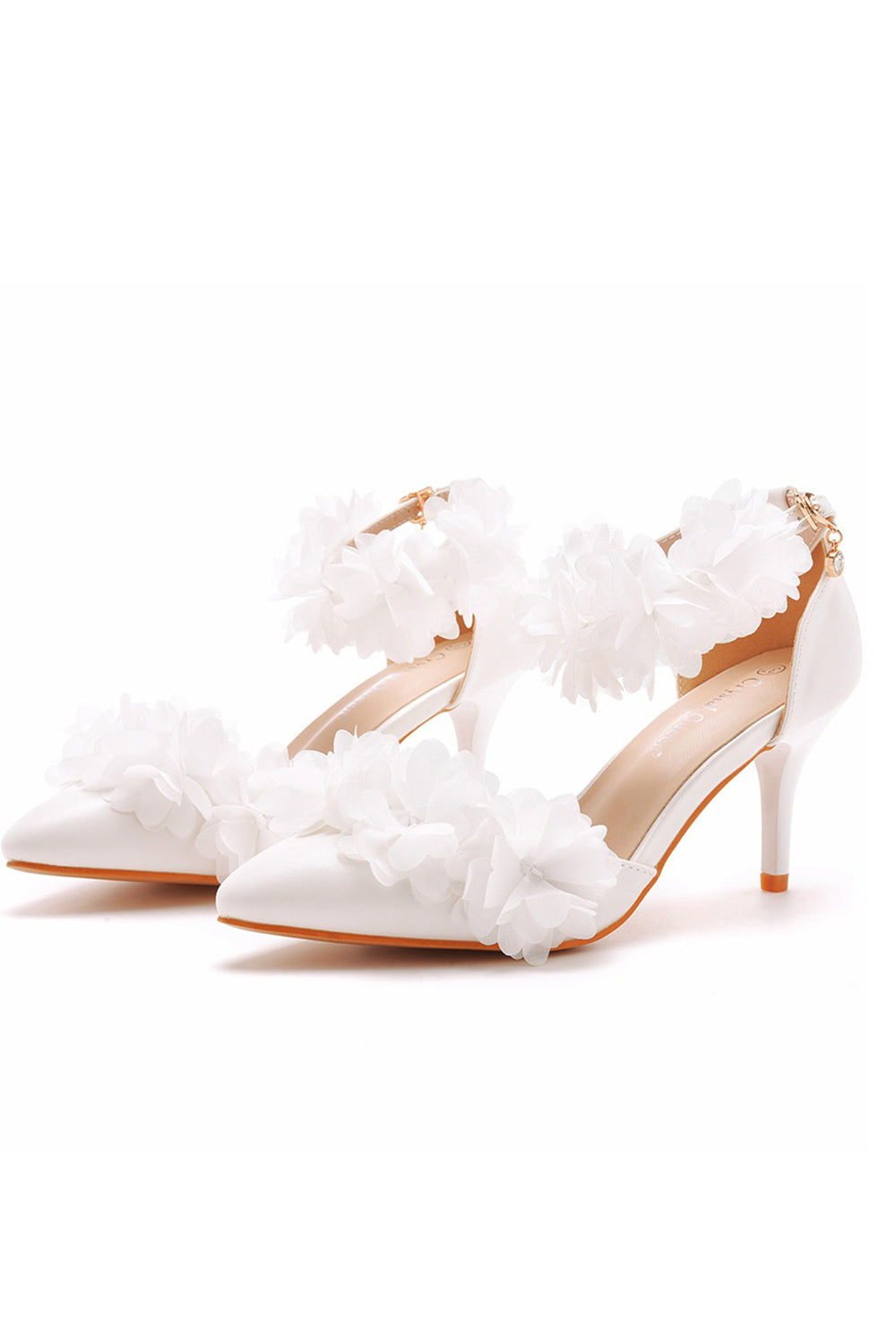 Escarpins à talons hauts et bride cheville à bout pointu et fleurs blanches
