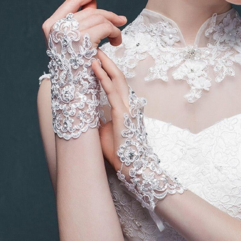 Fingerless Elegant Short Lace Wedding Gloves | Bridelily - wedding gloves