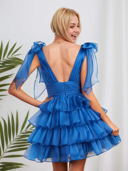 Robe de soirée trapèze bleu roi tendance à volants et nœud