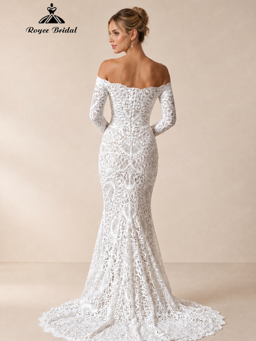 Back view of an ivory long-sleeve lace mermaid wedding dress with a buttoned back and scalloped train.