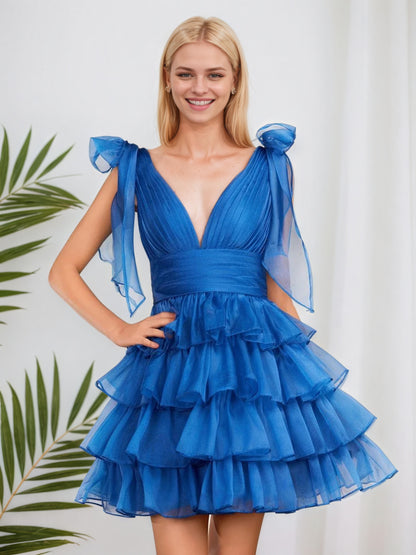 Robe de soirée trapèze bleu roi tendance à volants et nœud