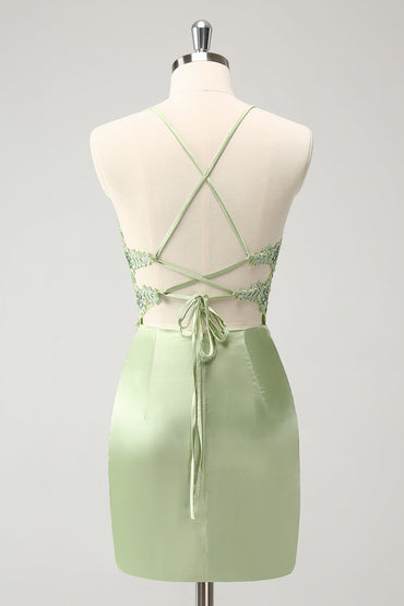 Robe de soirée courte verte élégante avec corset croisé dans le dos et appliqués