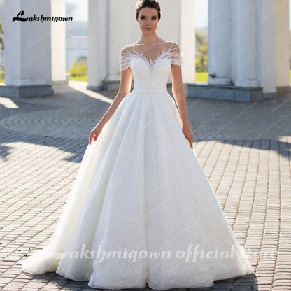 Roycebridal Sparkling Off-The-Shoulder Wedding Dress Elegant Glitter Lace A-Line Bridal Gown with Illusion Pleats Short Sleeves