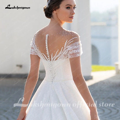 Roycebridal Sparkling Off-The-Shoulder Wedding Dress Elegant Glitter Lace A-Line Bridal Gown with Illusion Pleats Short Sleeves