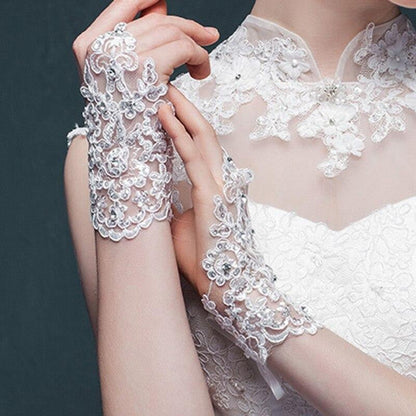 Fingerless Elegant Short Lace Wedding Gloves | Bridelily - wedding gloves