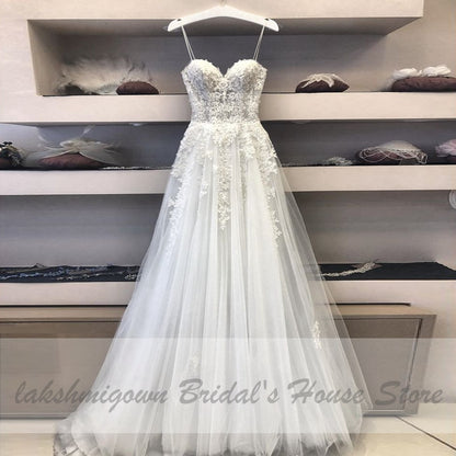 2021 Trouwjurk Sexy A Line Wedding Dress Spaghetti Straps Vintage Lace Applique Beaded Off White Tulle Mariage Long Bridal Dress - ROYCEBRIDAL OFFICIAL STORE