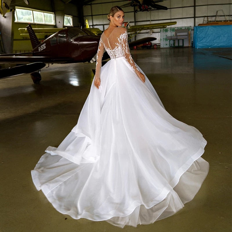 African Wedding Dresses 2023 Lace Applique Beading O-neck Organza Long Sleeve Wedding Gown Beach Bridal Dress