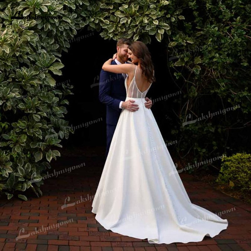 Simple A-Line Soft Satin Wedding Dresses 2021 V-Neck Sleeveless Lace Spaghetti Straps Hidden Skirt Pockets Backless Bride Gown