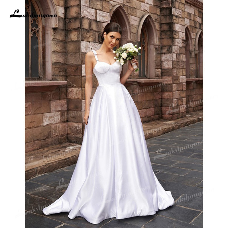 A-Line/Princess Soft Satin Wedding Dresses Low Sweetheart Neck Ruffles Straps Sleeveless Sweep/Brush Train Simple Bride Gown